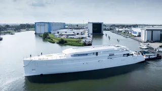 80m new build Feadship Project 1015 arrives in Makkum for outfitting