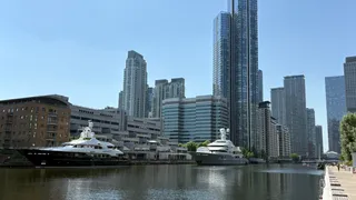 six yachts berthed in london, uk, during summer heatwave 2026