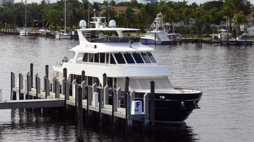 magical-days-watershed-ii-motor-yacht-president-87-2007-27m-moored-half-profile-before-refit